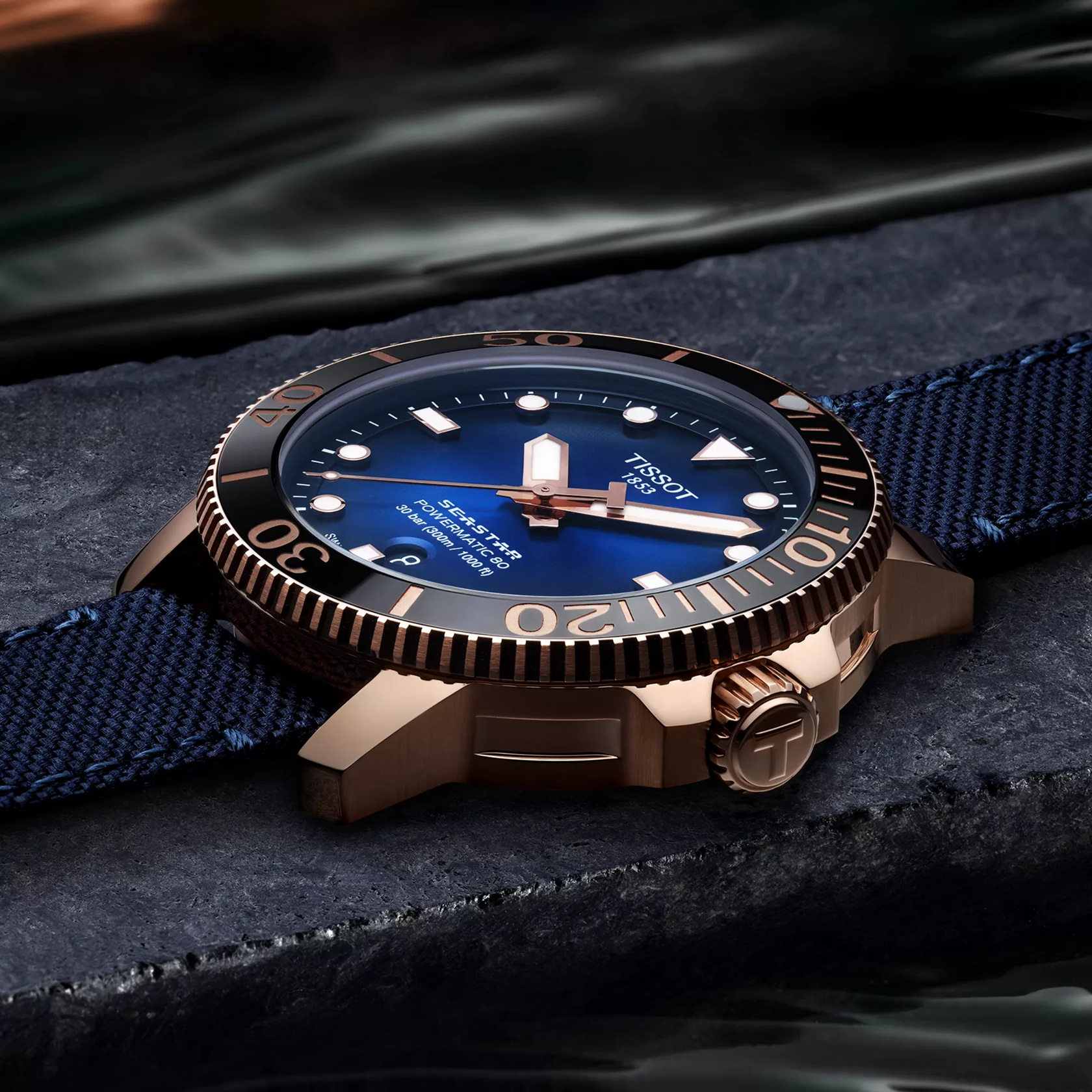 Tissot Seastar 1000 Powermatic 80 watch on a colored background