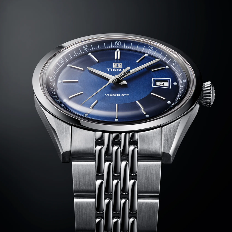 Tissot Visodate 39mm watch on a colored background