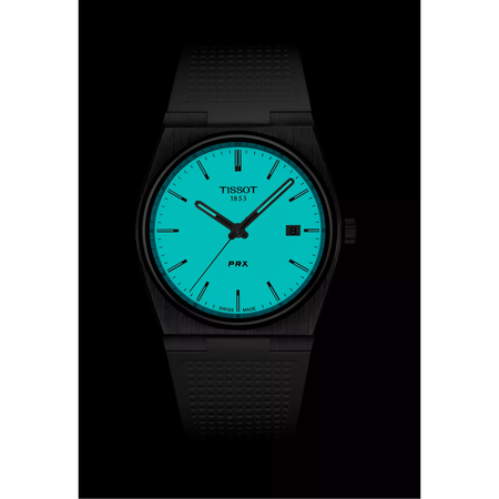 Front view of the watch Tissot PRX 40mm in night mode