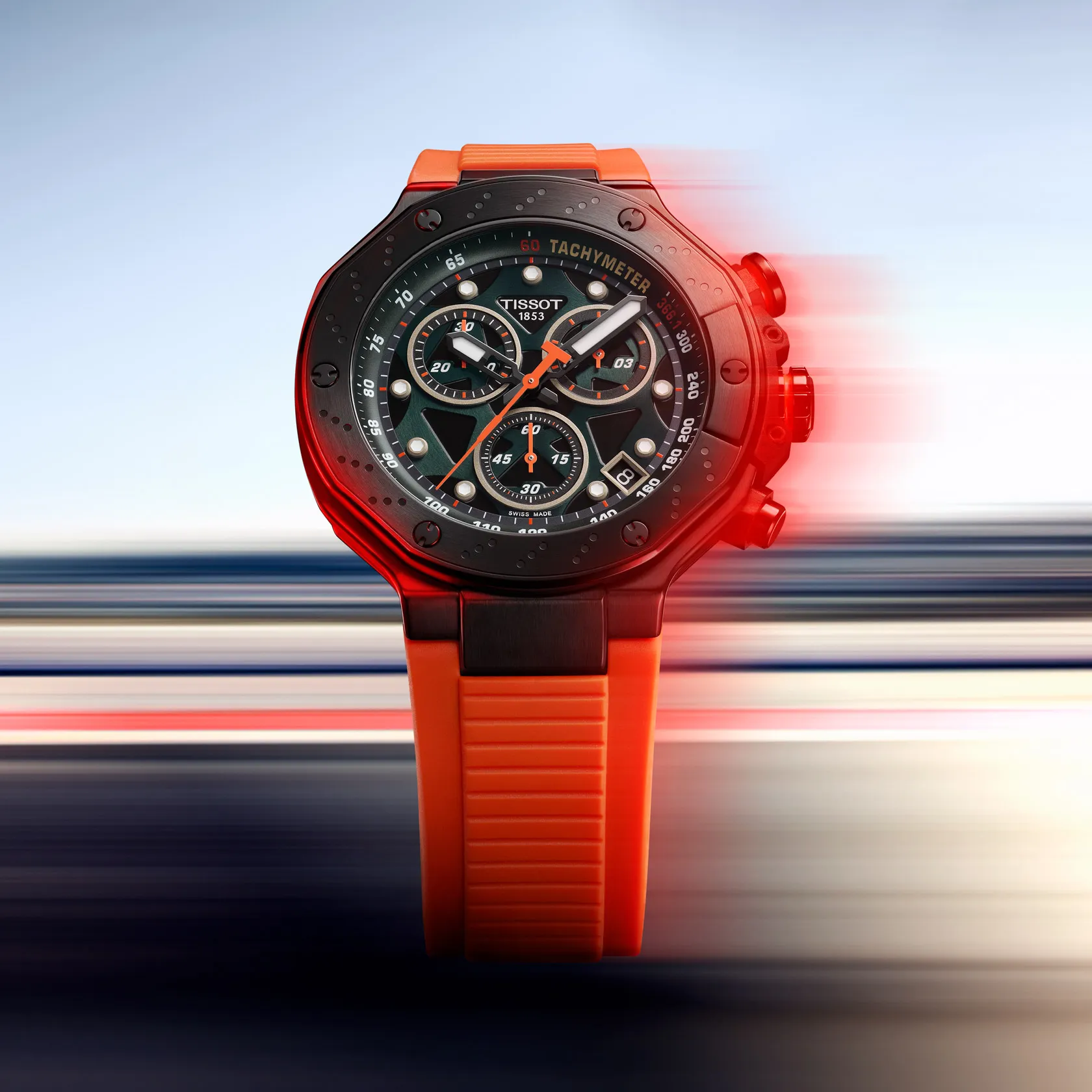 Tissot T-Race 45mm watch on a colored background