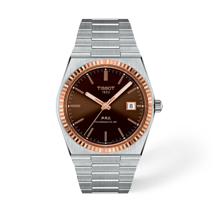 Front view of the watch Tissot PRX Gold 40mm with shadow