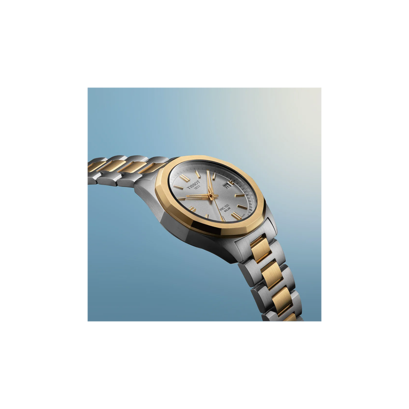 Tissot PRC 100 Solar 34mm watch on a coloured background