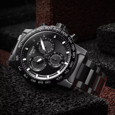 Tissot Supersport Chrono 45.5mm watch on a colored background