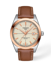 Vista frontal del reloj Tissot Gentleman Gold bezel 40mm con sombra