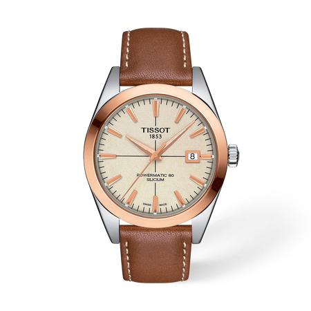 Vista frontal del reloj Tissot Gentleman Gold bezel 40mm con sombra