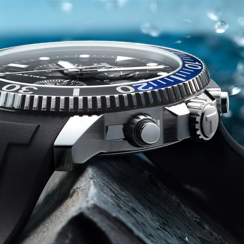 Tissot Seastar 1000 Quartz Chronograph watch on a colored background