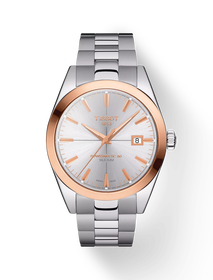 그림자가 있는 티쏘 젠틀맨 파워매틱 80 실리시움 솔리드 18K 골드 베젤 시계의 전면 보기