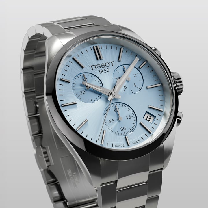 Tissot PR516 men's chronograph watch with a light blue dial and stainless steel bracelet.