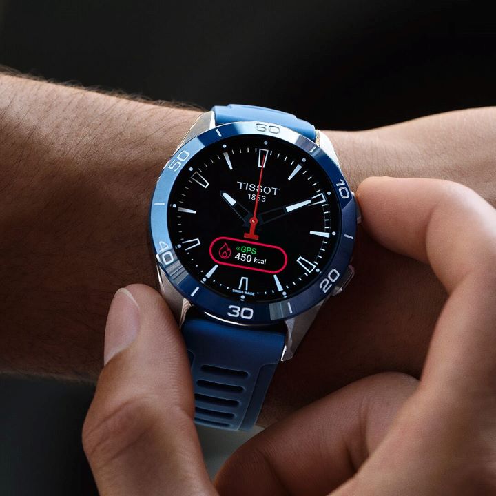 Close-up of the blue version of T-Touch Connect Sport on a man's wrist