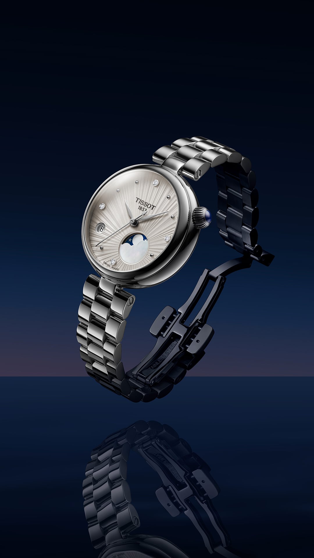 Woman wearing the Tissot Désir Moonphase at night