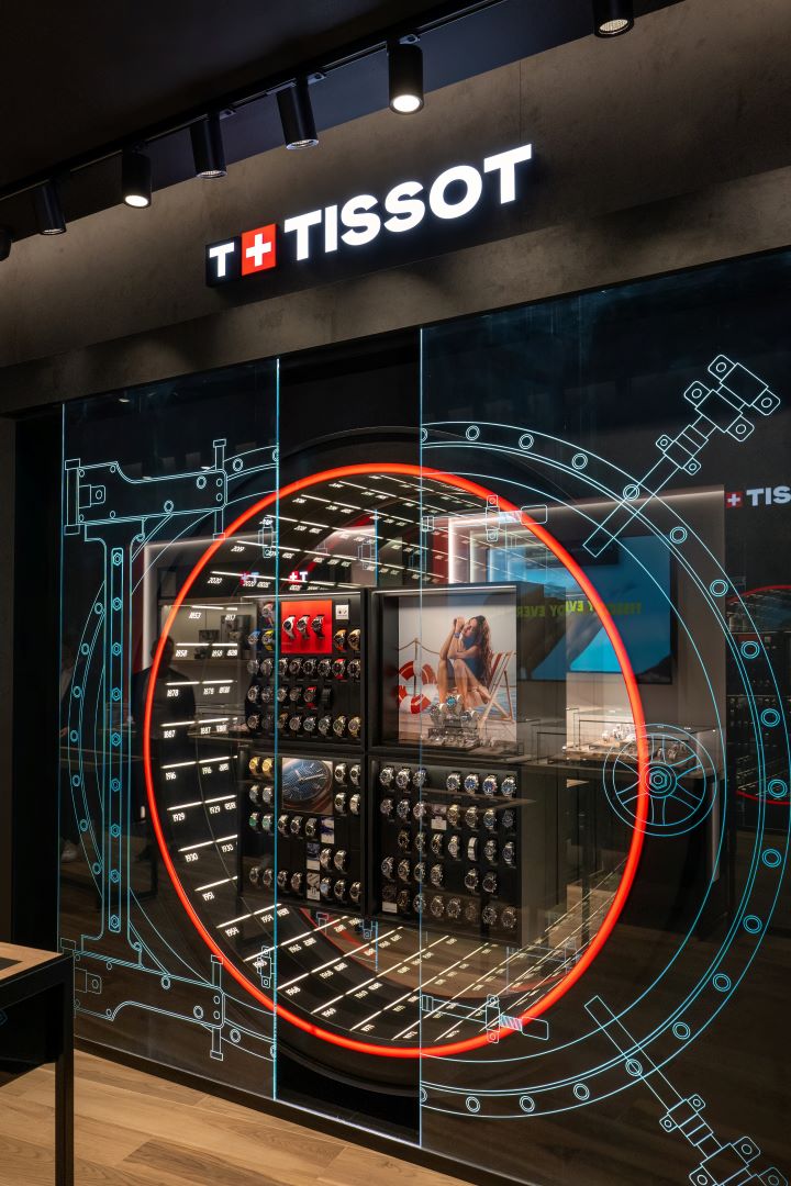 Een Tissot-kluis met verlichte horlogecollecties.