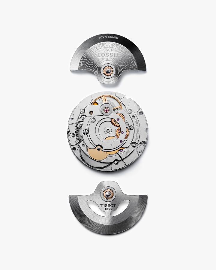 Tissot automatic watch movement, with rotor, oscillating mass, and detailed components, including the Tissot 1853 logo.
