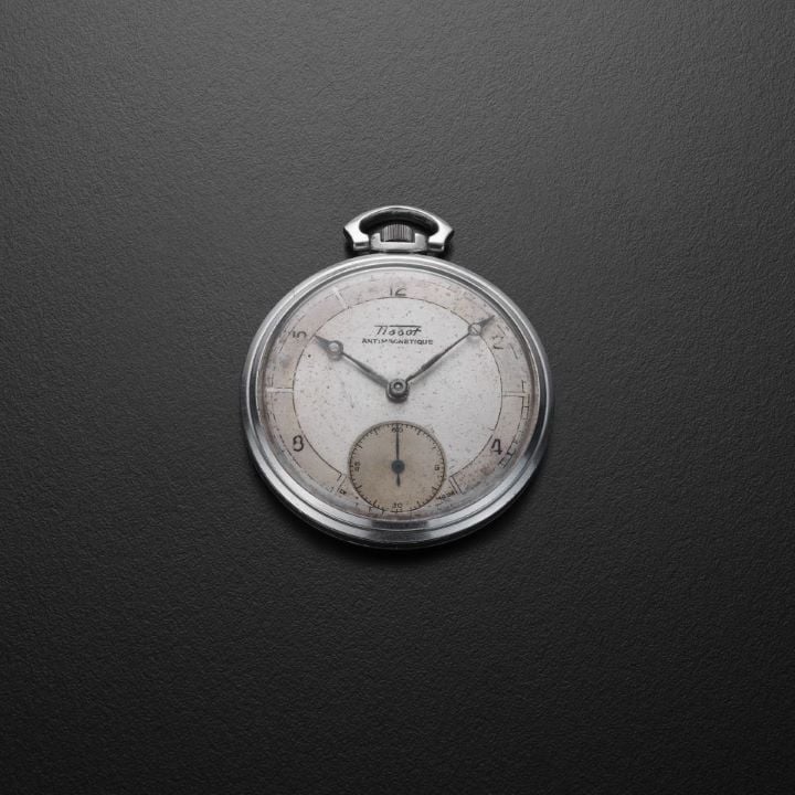 Tissot pocket watch before cleaning.