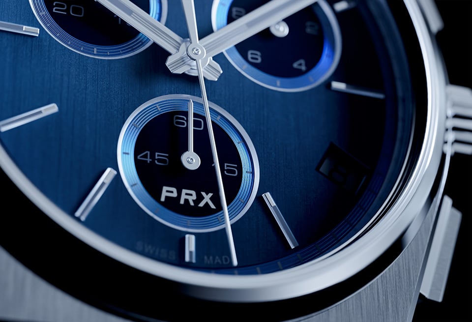 A close view of the blue PRX chronograph dial.