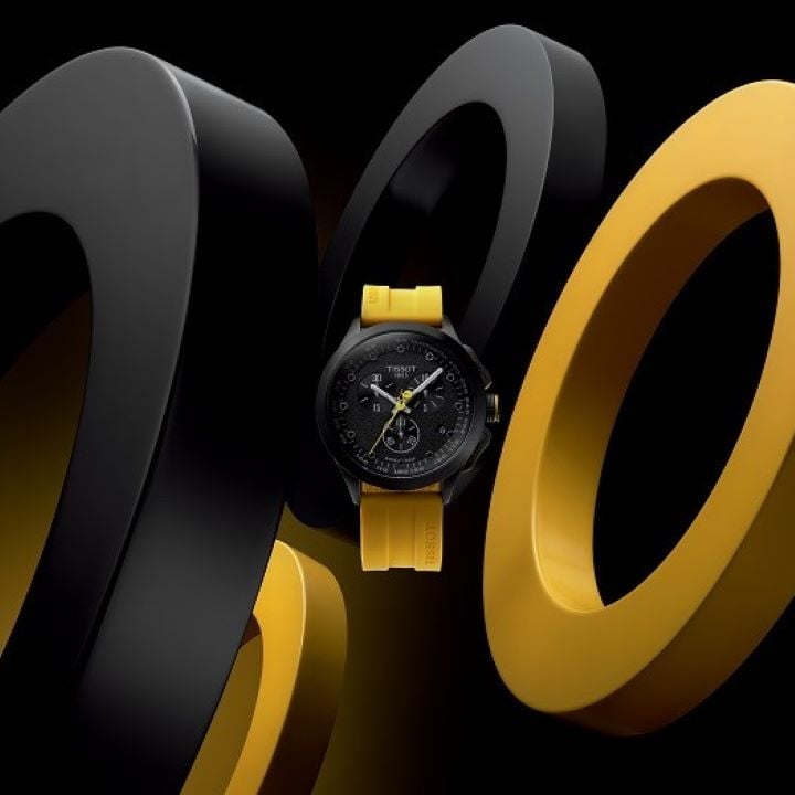 A limited edition Tissot Tour de France watch with a black dial and a bold yellow strap. 