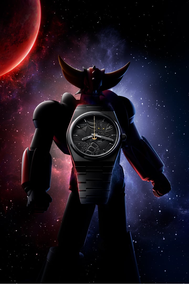 Im Vordergrund die schwarze Tissot UFO Robot Grendizer 50th Anniversary Uhr, im Hintergrund das Weltall und die Silhouette der Grendizer Anime-Kultfigur.