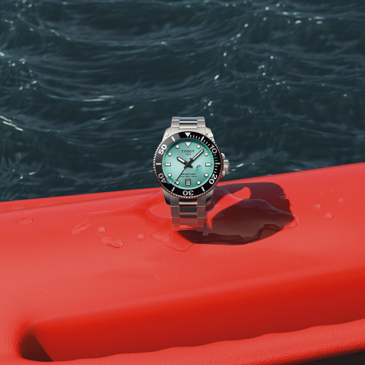 The Seastar Quartz 40mm with a turquoise dial on a red buoy