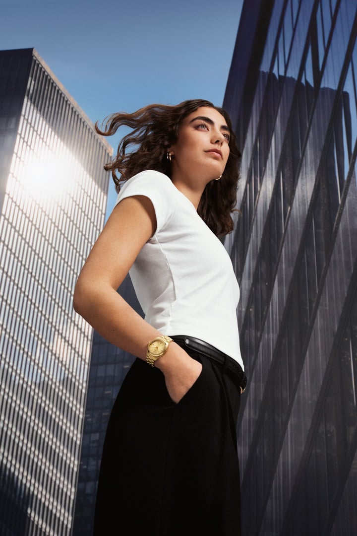 A women having a PR 100 Sport chic in hand 