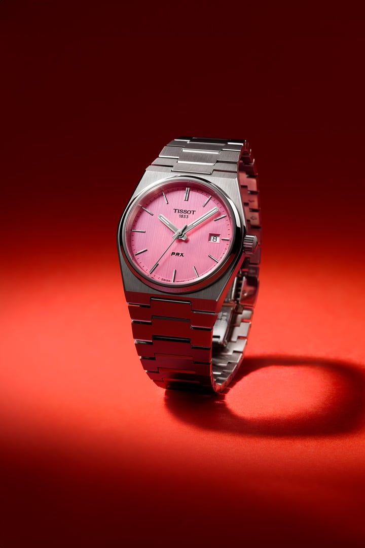 Tissot PRX against a red background