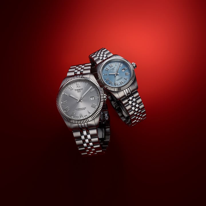 Tissot Ballade COSC front of a red background 