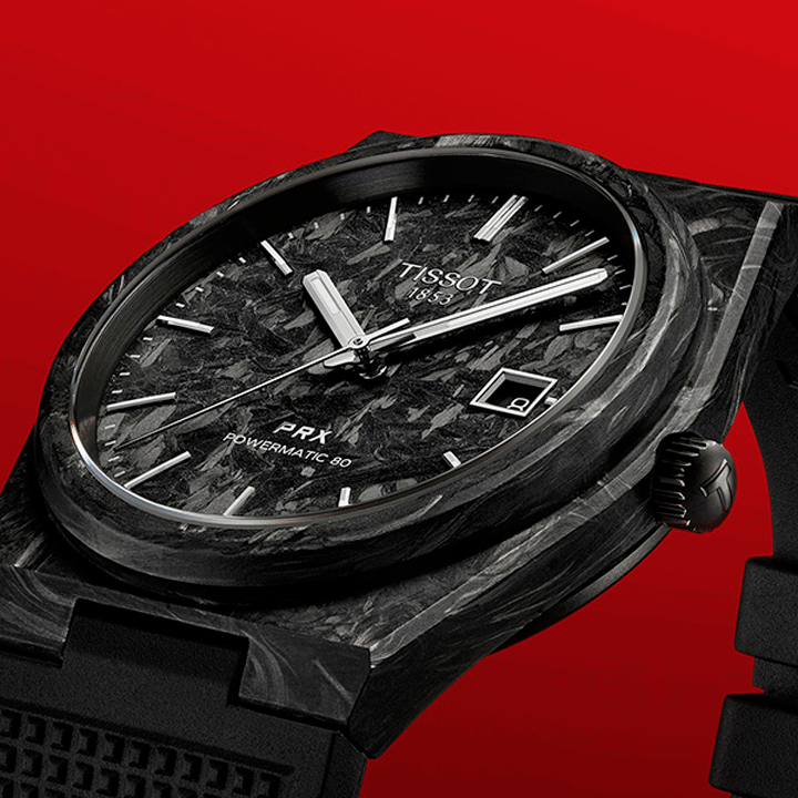 Tissot PRX Carbon with red background