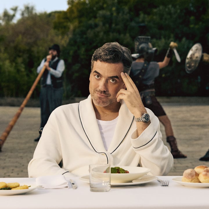 Actor Daniel Ings sat at a table during a day on set