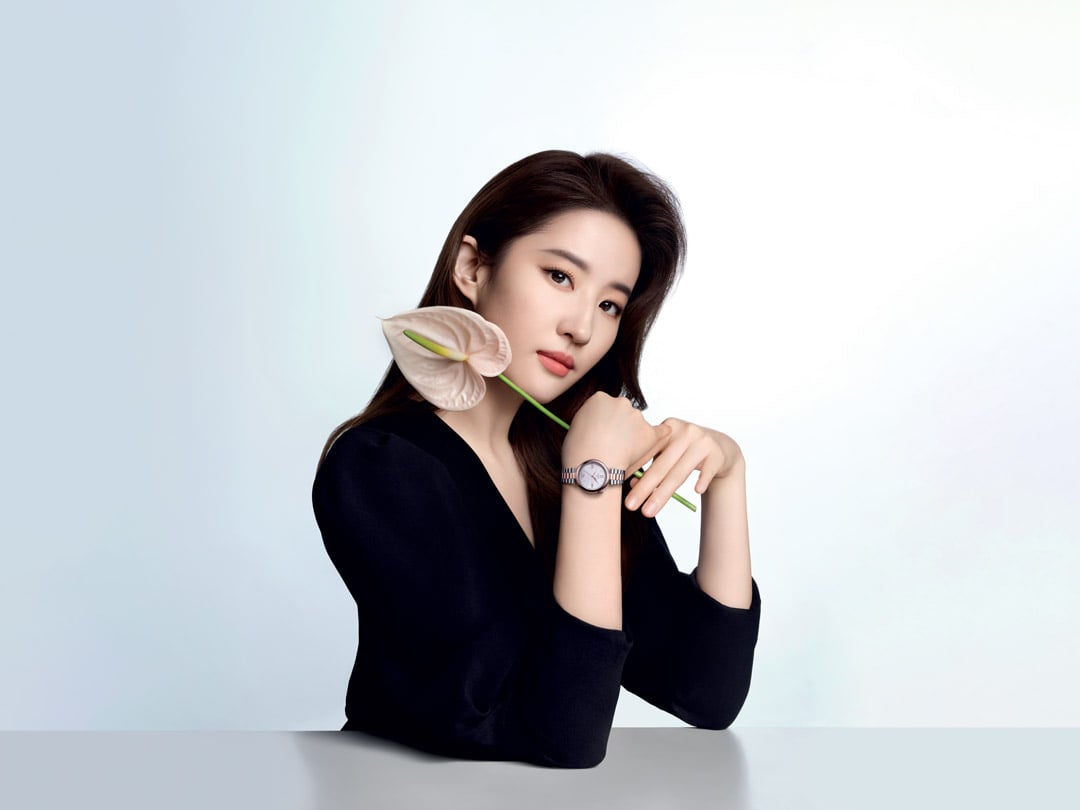 Liu Yifei movie star and singer posing with a Tissot watch