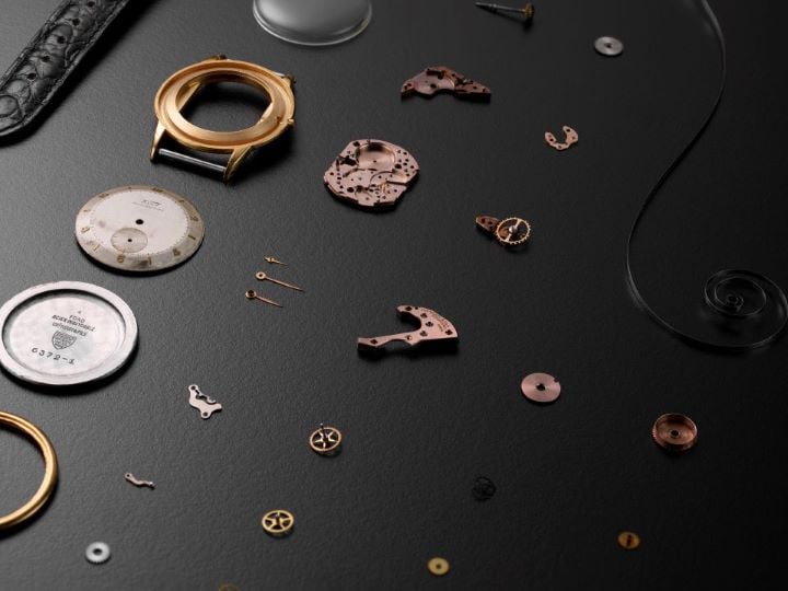 Set of Tissot watch components displayed separately.