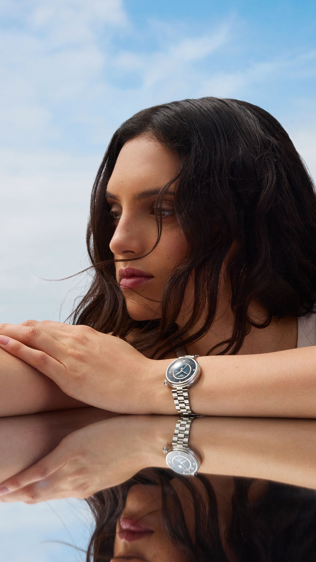 Woman wearing the Tissot Désir Moonphase by day