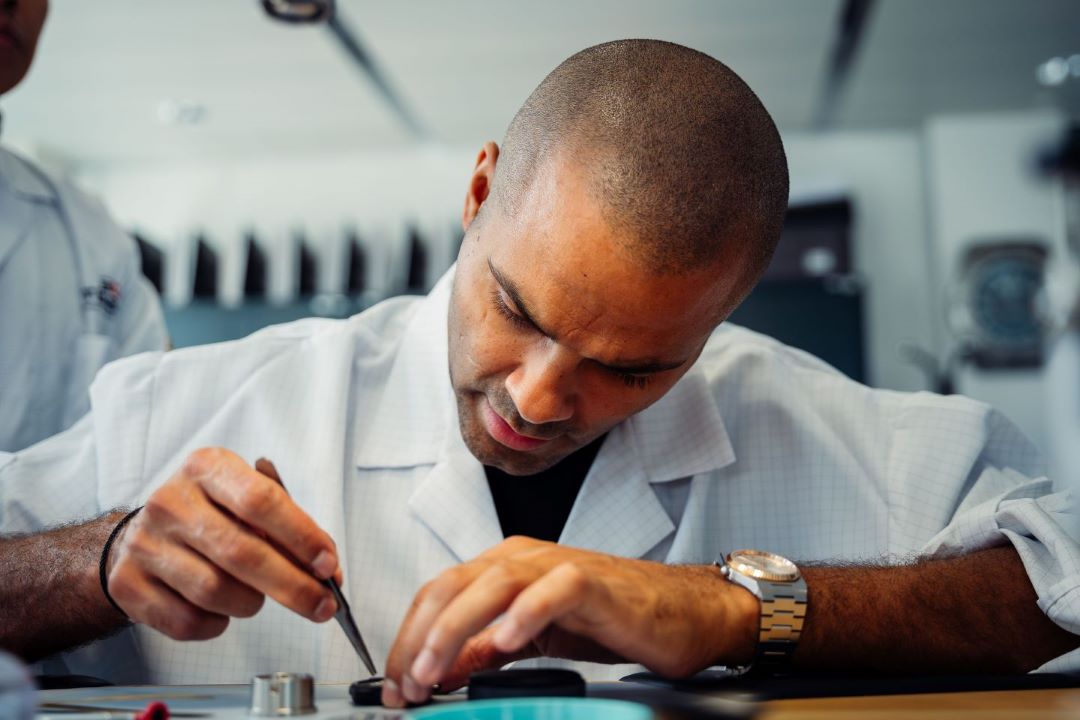 Tony Parker trying his hand at precision watchmaking on a Tissot watch