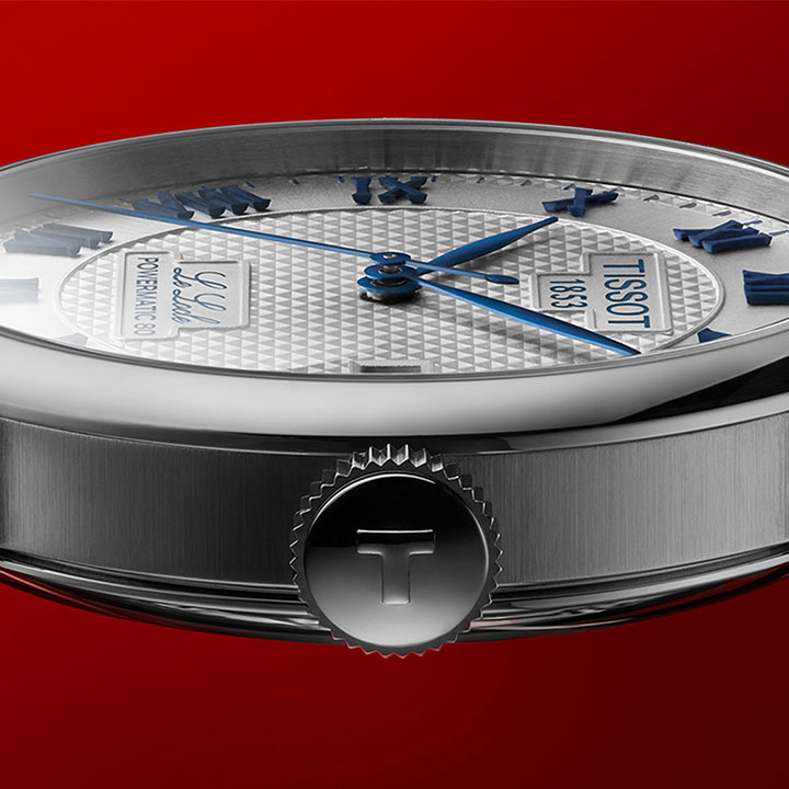 Tissot Le Locle 20th Anniversary on a dark red background