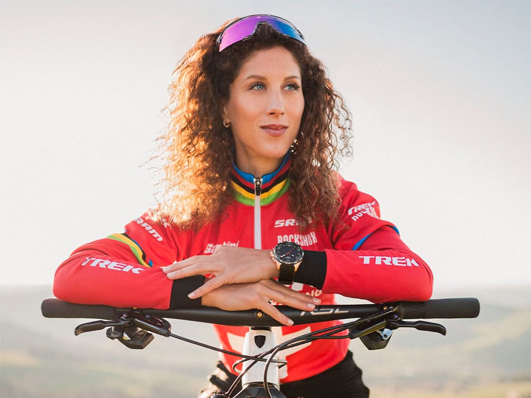 Jolanda Neff on a bike wearing a T-Touch Connect watch 