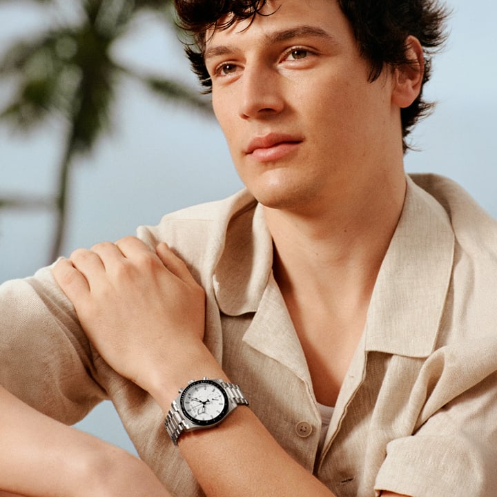 Man wearing a Tissot Gentleman on a movie set