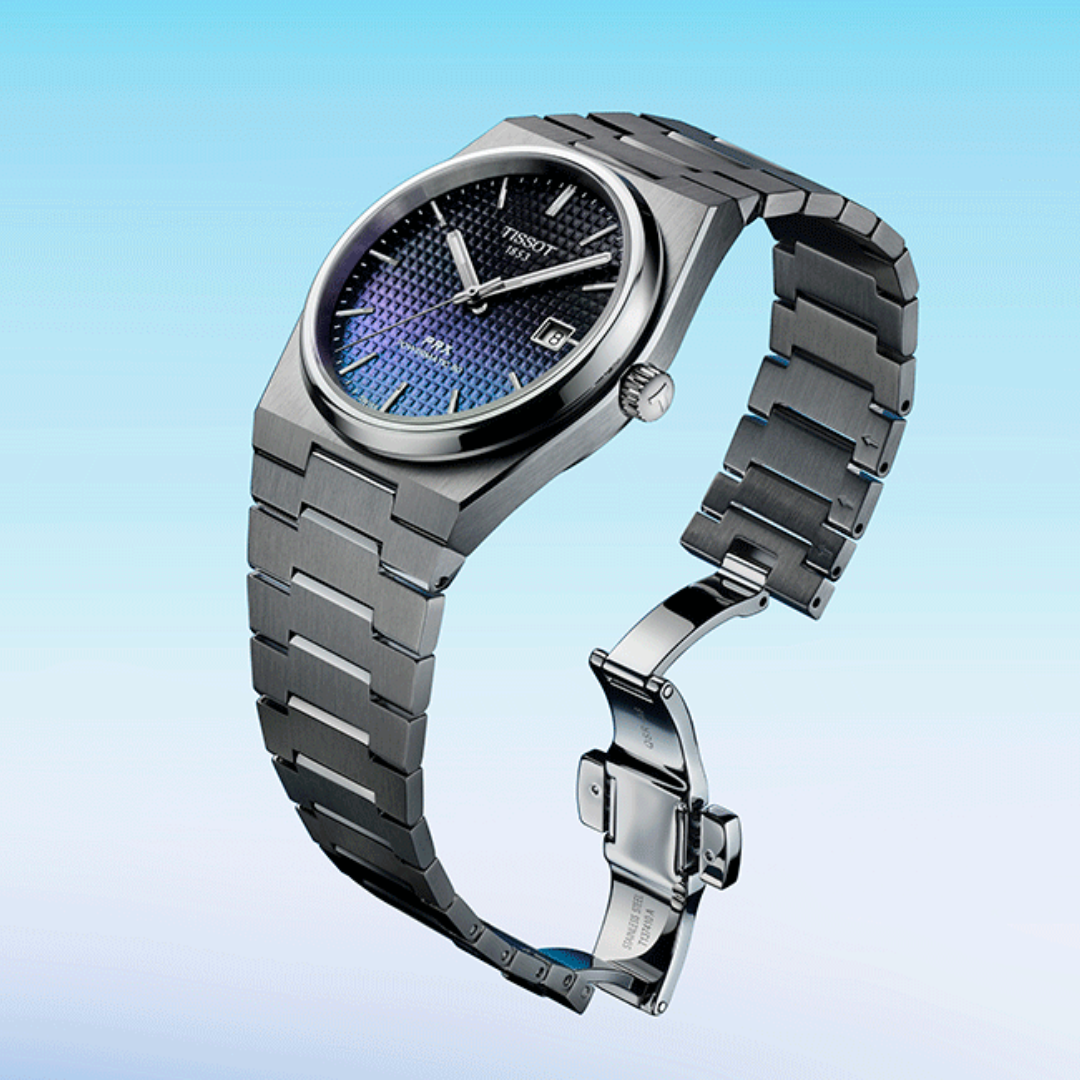Tissot PRX Gradient watch levitating on a light blue background