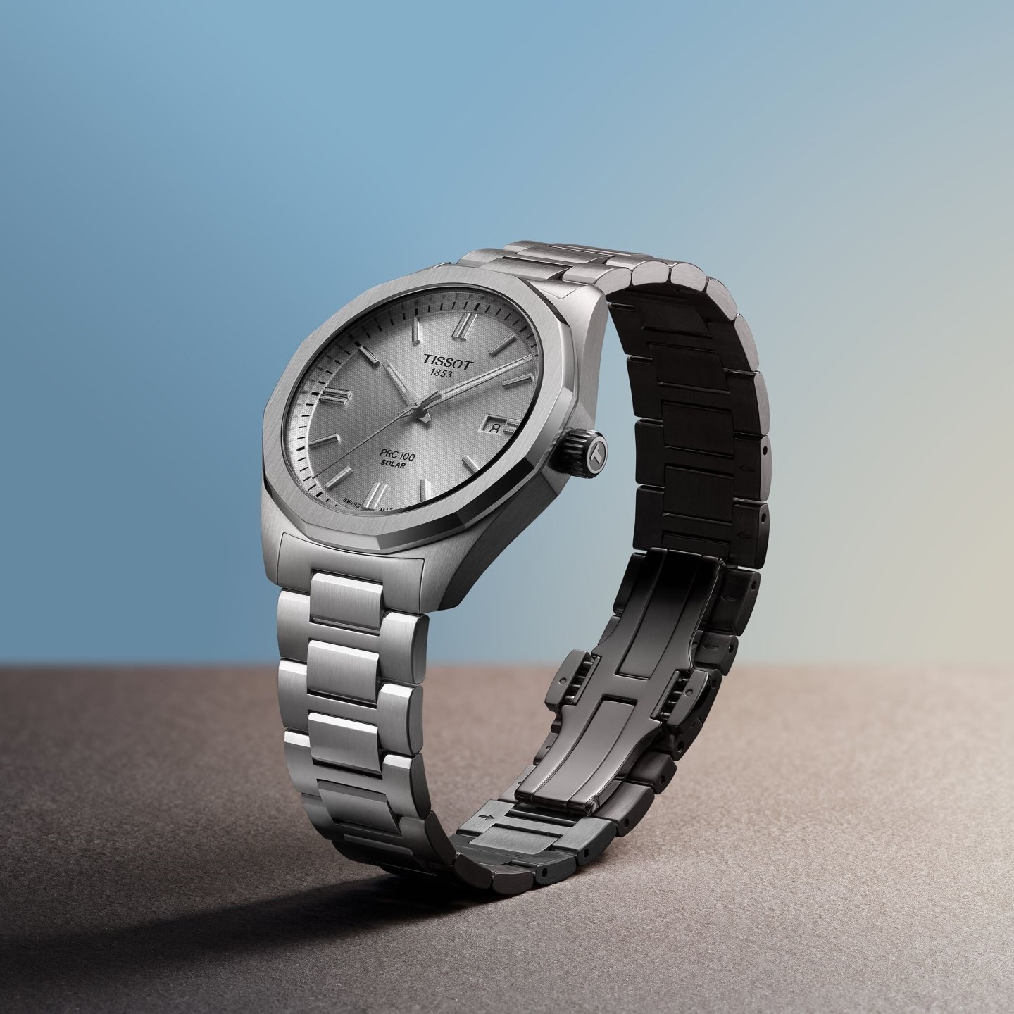 PRX with Gold bezel against a neutral background