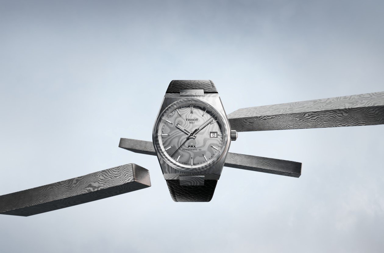 Tissot Damascus Steel against a sky background