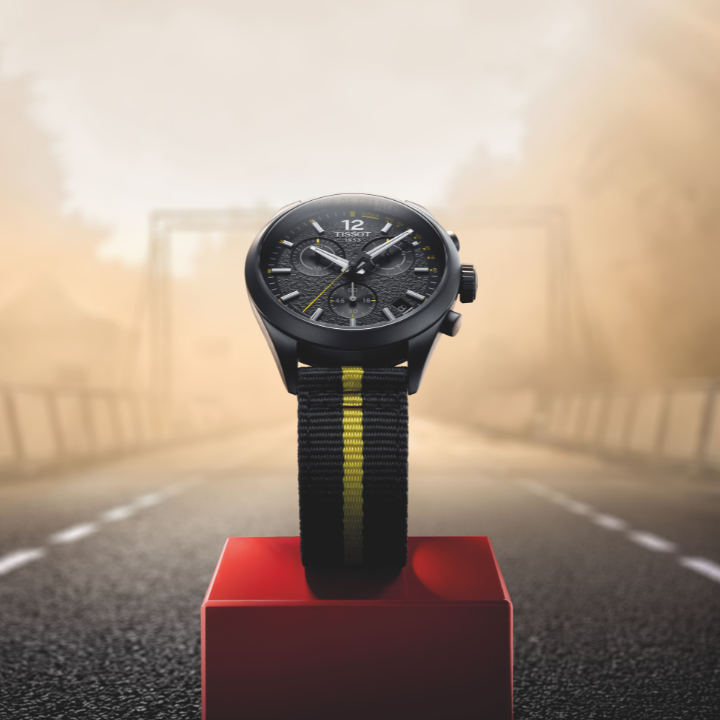 Tissot PR 100 Tour de France with a bike-shaped second hand and black leather strap