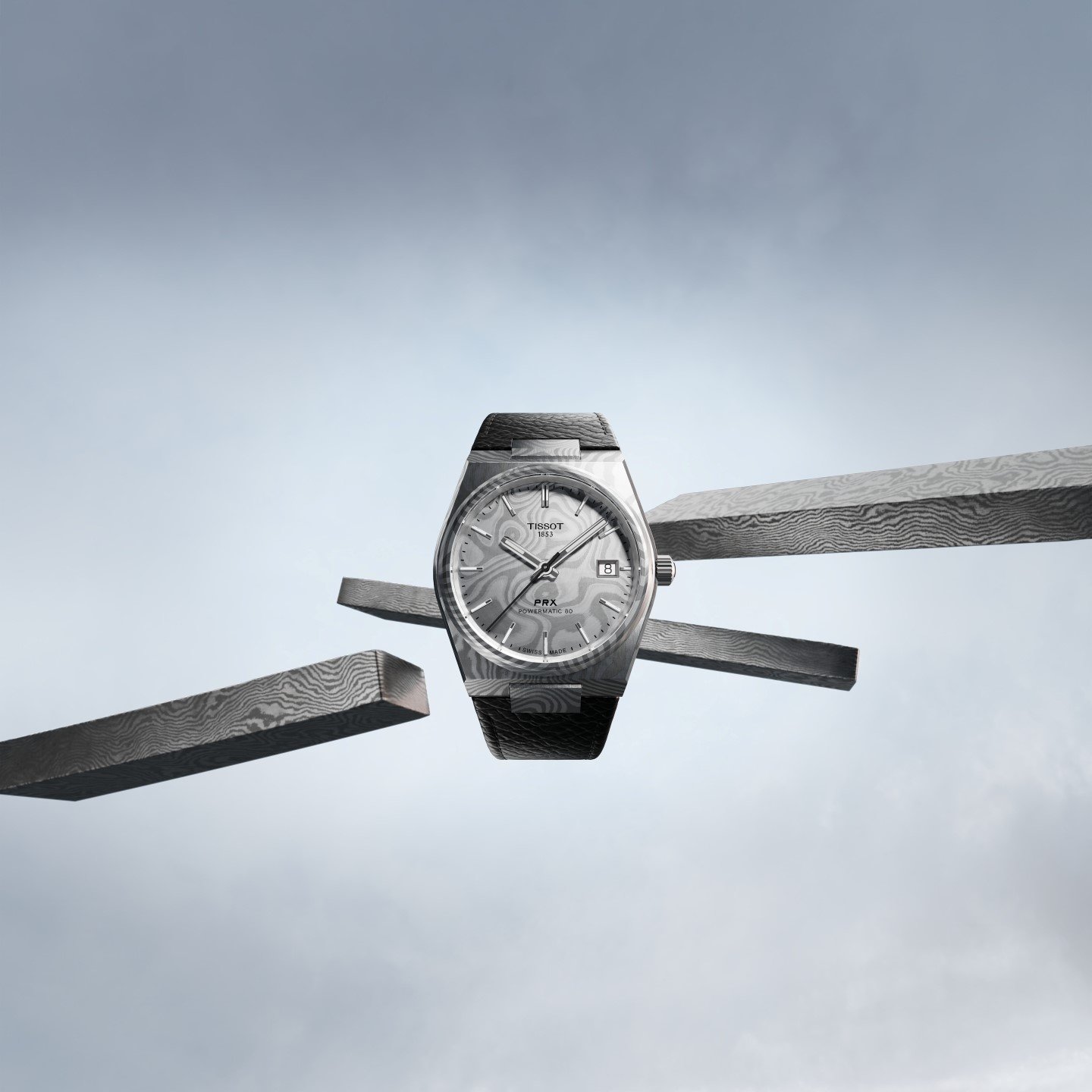 Close up of a Tissot PRX with an Ice blue dial